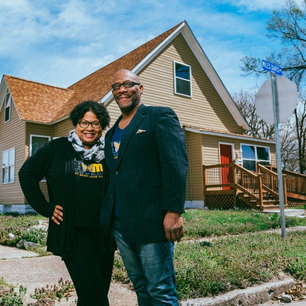 Lauren Parks and Jas Gary Pearson outside the childhood home of Miles Davis