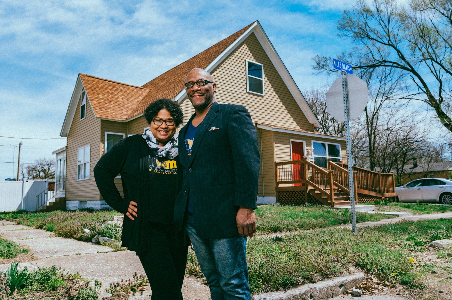 Lauren Parks and Jas Gary Pearson outside the childhood home of Miles Davis